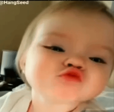 Baby Making Funny Face With Lips GIF