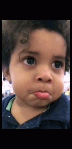 Baby Making Funny Face With Tongue Out GIF