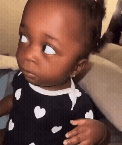 Baby Making Funny Face GIF