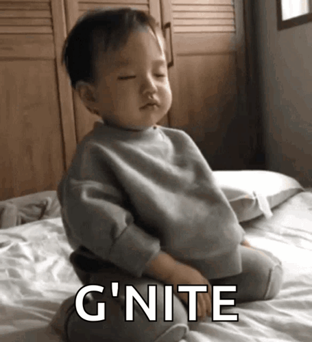 Baby On Bed With Eyes Closed G Nite GIF