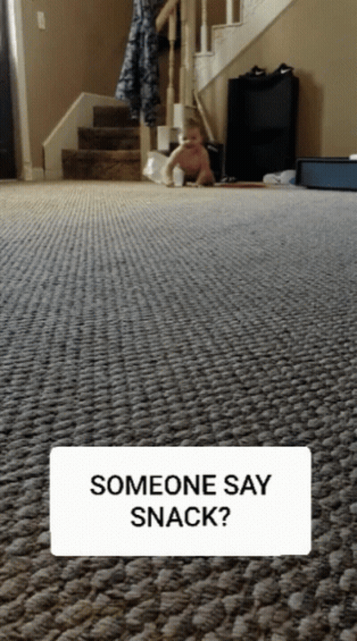 Baby On Floor With Someone Saying Snack GIF