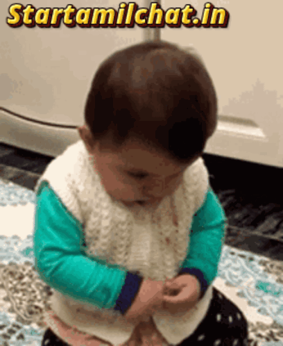 Baby On Rug With Startamilchat.in GIF