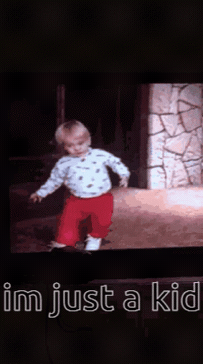 Baby On TV Screen Saying I'm Just A Kid GIF