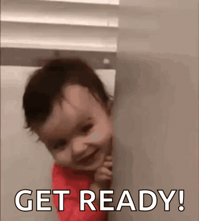 Baby Peeking From Behind Wall Saying Get Ready GIF