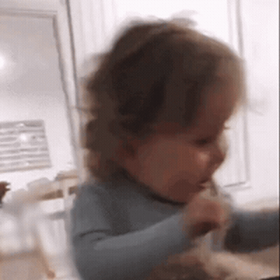 Baby Playing With Toy In Living Room GIF