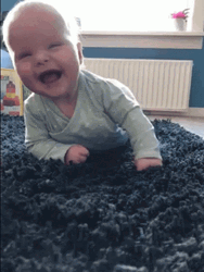 Baby Rolling On The Floor Laughing GIF