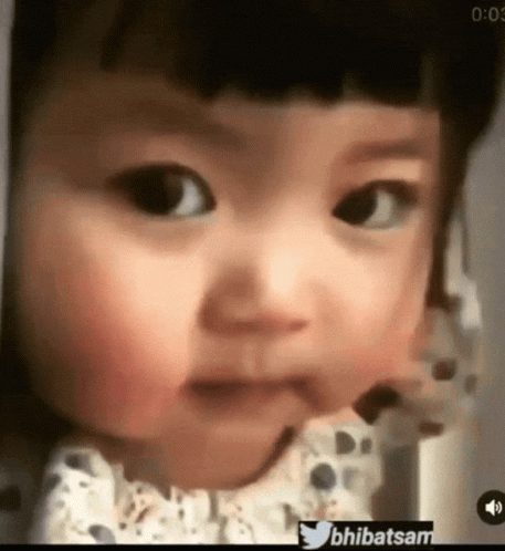 Baby's Face In Blurry Photo With Twitter Hashtag Bhibatsam GIF