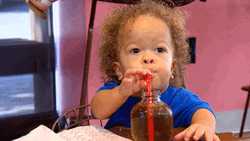 Baby Sipping Juice GIF