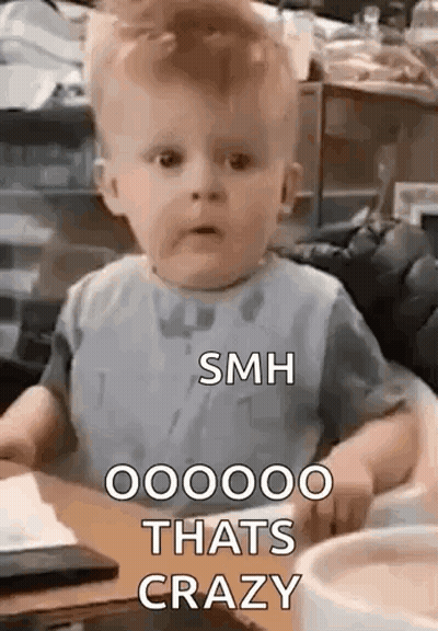 Baby Sitting At Table With Coffee GIF