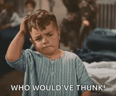 Baby Sitting At Table With Fish Bowl GIF