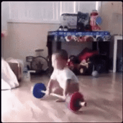 Baby Sitting Holding Barbell GIF