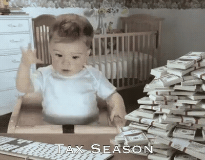 Baby Sitting In Cardboard Box With Money GIF