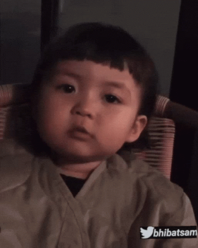 Baby Sitting In Chair With Twitter Logo GIF
