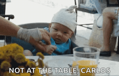 Baby Sitting In High Chair Being Fed GIF
