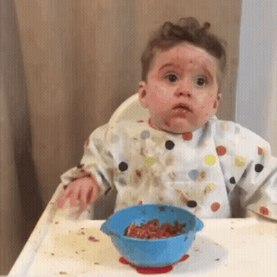 Baby Sitting In High Chair With Food GIF