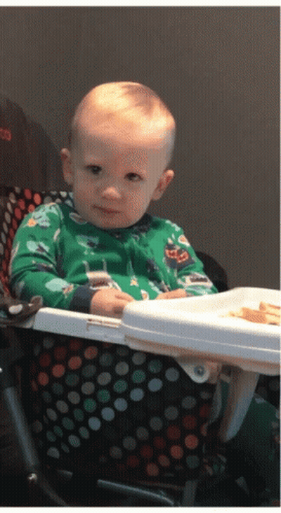 Baby Sitting In High Chair With Food Tray GIF