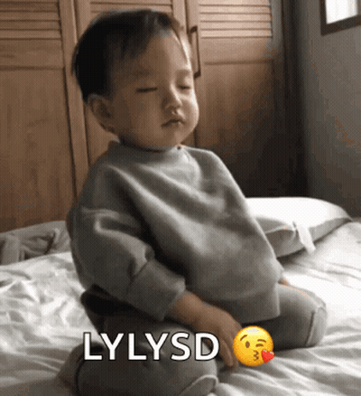 Baby Sitting On Bed With Lylysd GIF