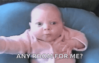 Baby Sitting On Blue Pillow Saying Any Room For Me GIF