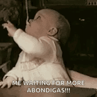 Baby Sitting On Chair With Spoon Says More Abondidas GIF