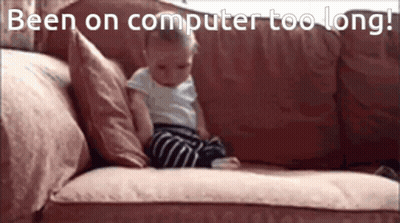 Baby Sitting On Couch Saying Been On Computer Too Long GIF
