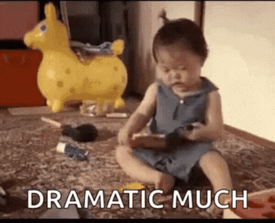Baby Sitting Playing With Remote And Toy GIF