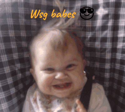 Baby Smiling In Front Of WSG Babes Sign GIF