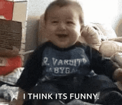 Baby Smiling In Varsity Byga Shirt GIF