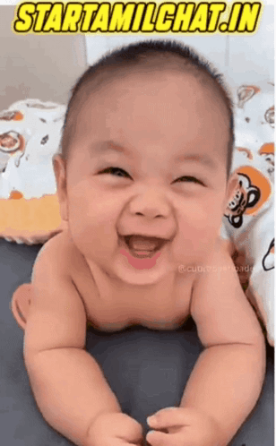 Baby Smiling On Stomach Starttamilchat.in GIF