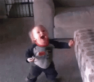 Baby Standing In Living Room With Mouth Open GIF