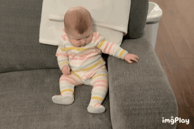 Baby Striped Outfit Sitting On Couch Imgplay GIF