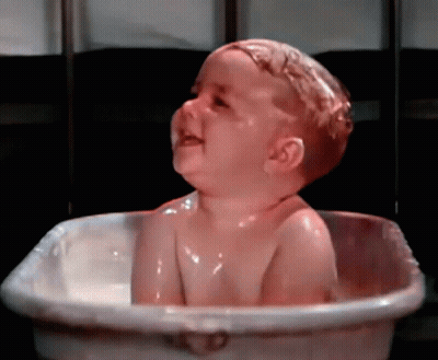 Baby Taking Bath In Tub With Foam GIF