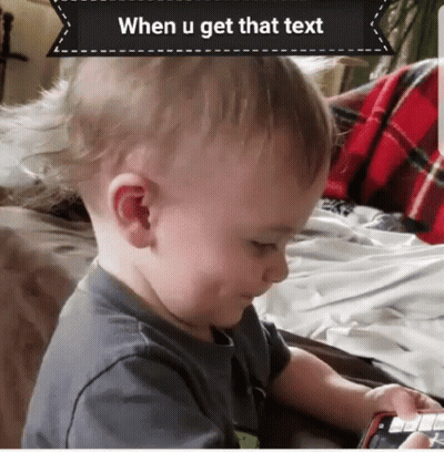 Baby Using Phone When U Get That Text GIF