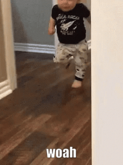 Baby Walking On Wooden Floor With Woah GIF