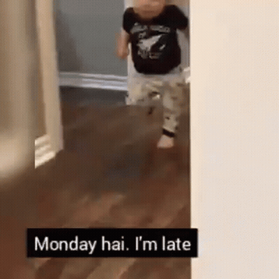Baby Walking Through Doorway Saying Monday Hai I'm Late GIF