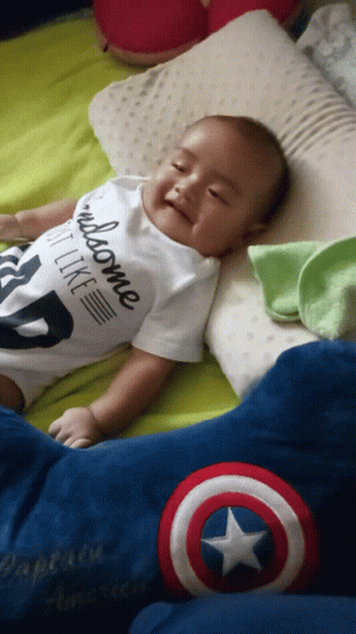Baby Wearing Handsome Shirt Laying On Bed GIF