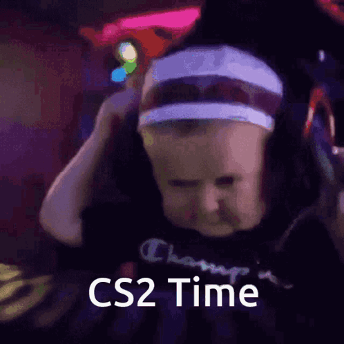 Baby Wearing Headphones With CS2 Time GIF