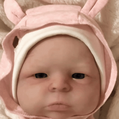 Baby Wearing Pink Hat With Ears GIF