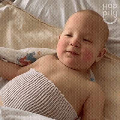 Baby With Chest Bandage Laying On Bed Hap Pillu GIF