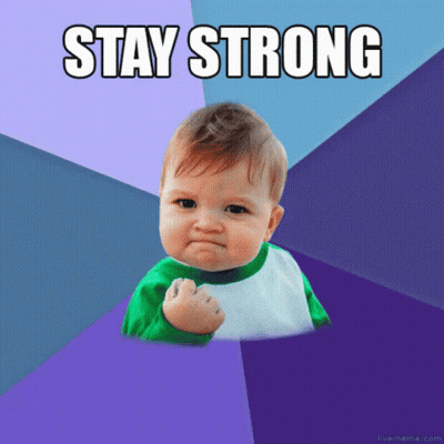 Baby With Fist In Air Saying Stay Strong GIF