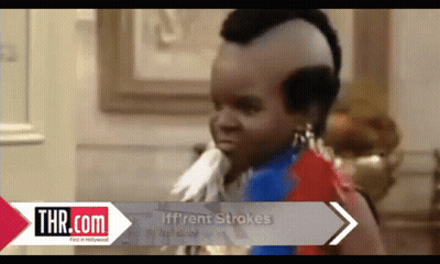 Baby With Mohawk Held By Woman With Thr.com GIF