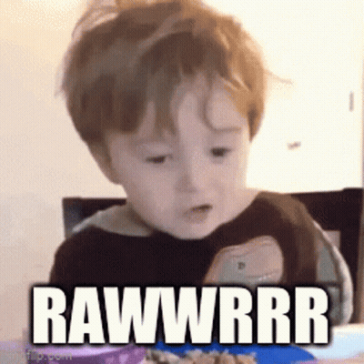 Baby With Plate Of Food Saying Rawwrrr GIF