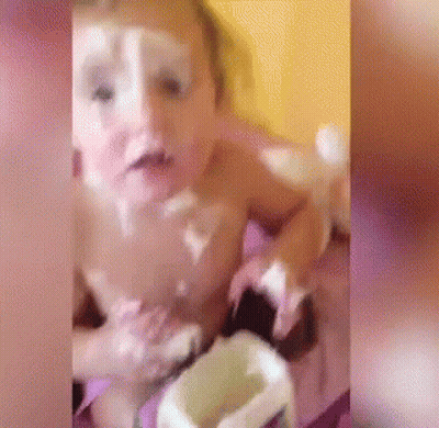 Baby Without Shirt Eating Cake GIF