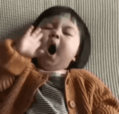Baby Yawning Covering Mouth GIF