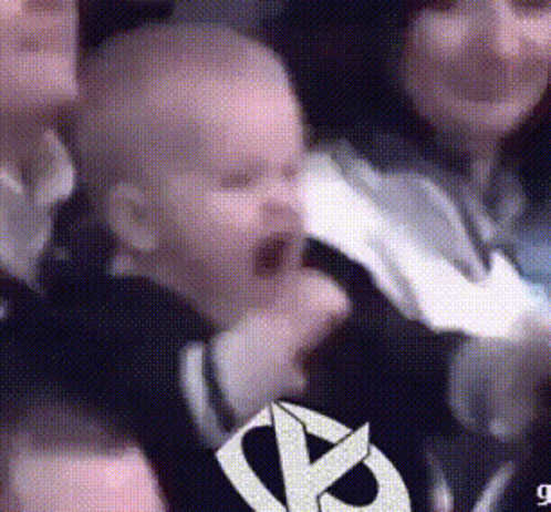 Baby Yawning In Black Shirt With Star GIF