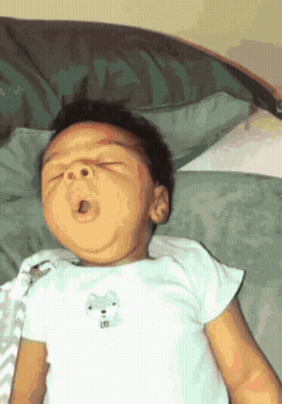 Baby Yawning In White Shirt With Wolf GIF