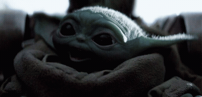 Baby Yoda Being Held In Blanket GIF