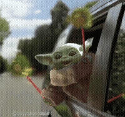 Baby Yoda Doll With Lollipop GIF