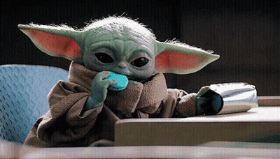 Baby Yoda Eating Blue Macaroon GIF