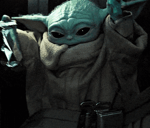 Baby Yoda From The Mandalorian Raising Hands With A Shiny Thing GIF