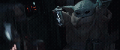 Baby Yoda Holding Food Bag GIF